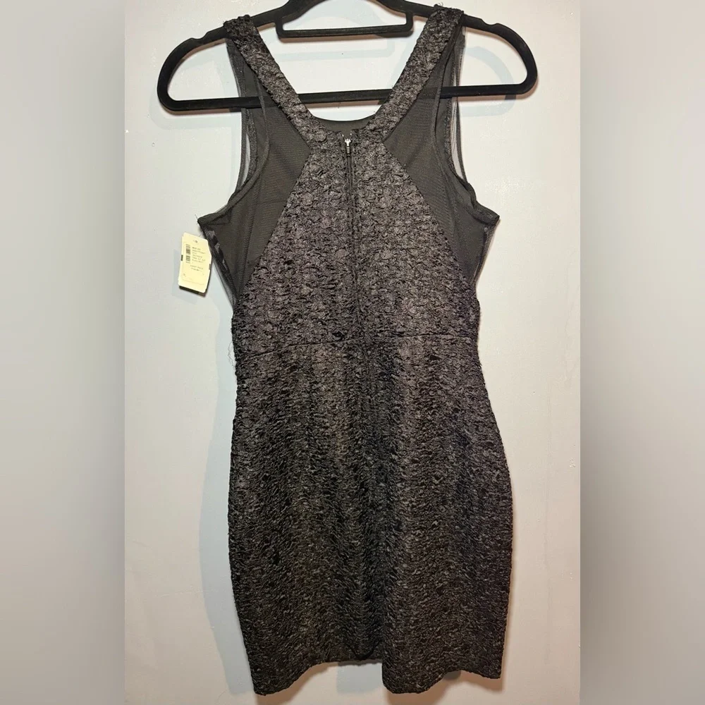 Adrianna Papell’s Hailey Logan Black Sleeveless Sheath Dress - Picture 2 of 4